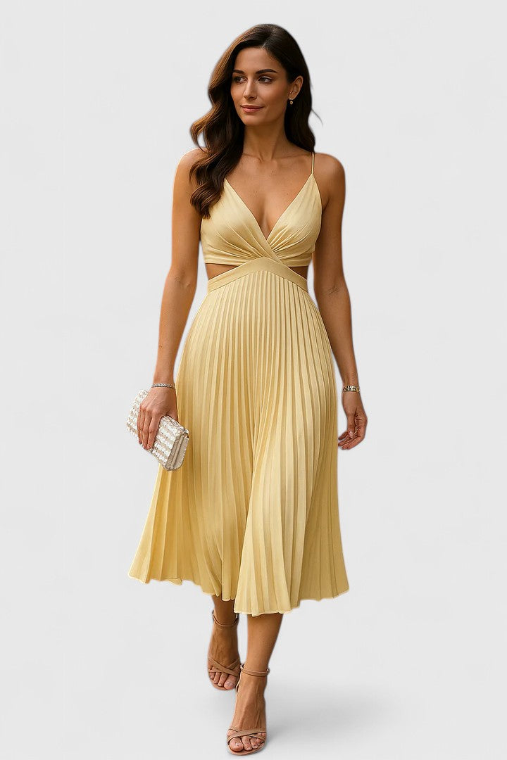 Fashionable women's sleeveless pleated dress, ideal formal wear for wedding guests.