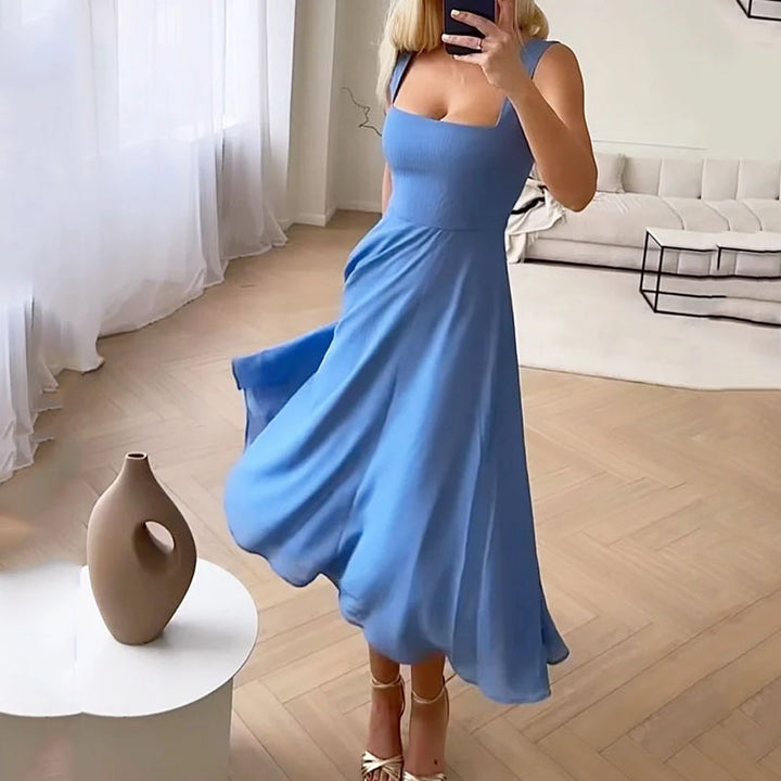 Chic white sleeveless solid midi dress for women, ideal for elegant summer parties or versatile everyday wear.