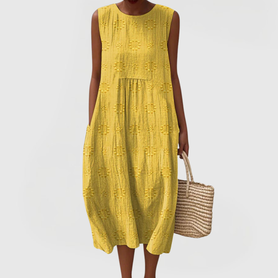 Flowy women's sleeveless summer dress, elegant and comfortable, with useful pockets for everyday wear.