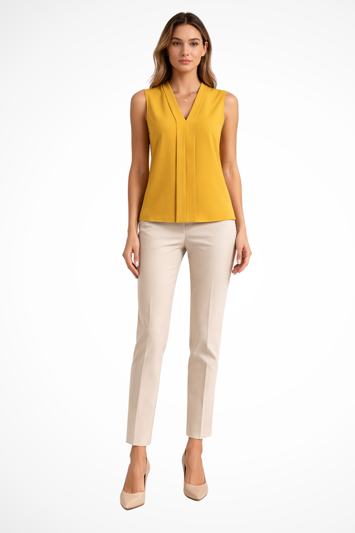 Elegant sleeveless V-neck women's top, perfect for chic workwear, smart casual looks, and summer fashion.