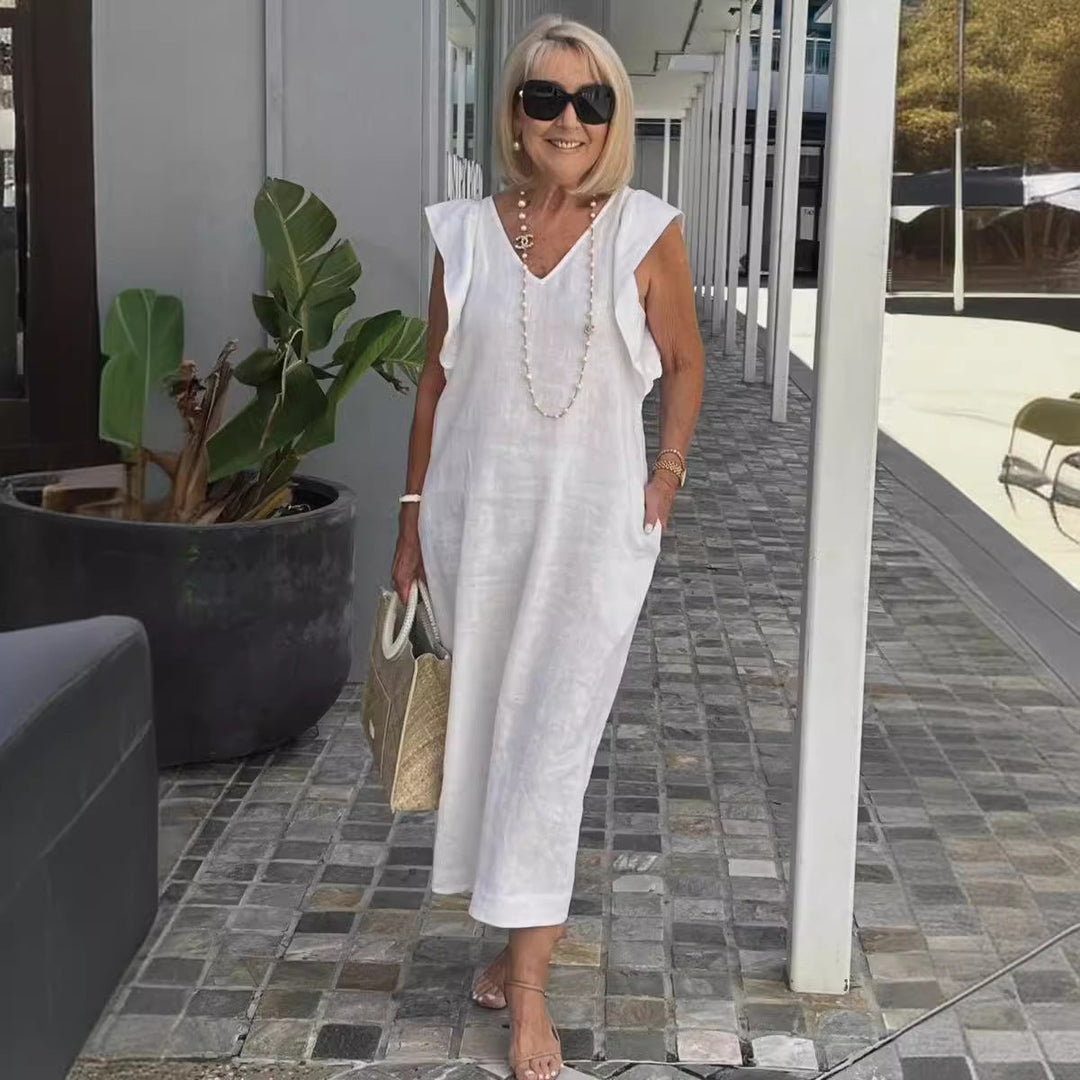 Elegant women's sleeveless V-neck maxi dress, perfect for stylish summer fashion and vacation.