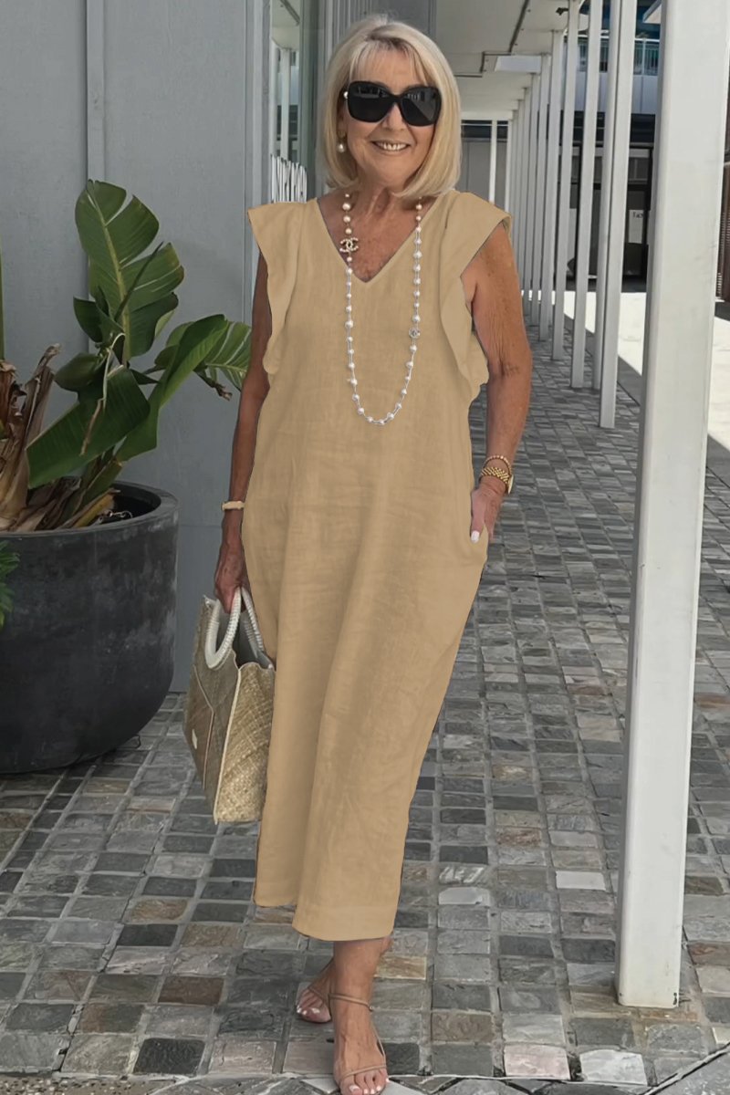 Women's fashionable V-neck summer maxi dress, flowy and stylish for various occasions.