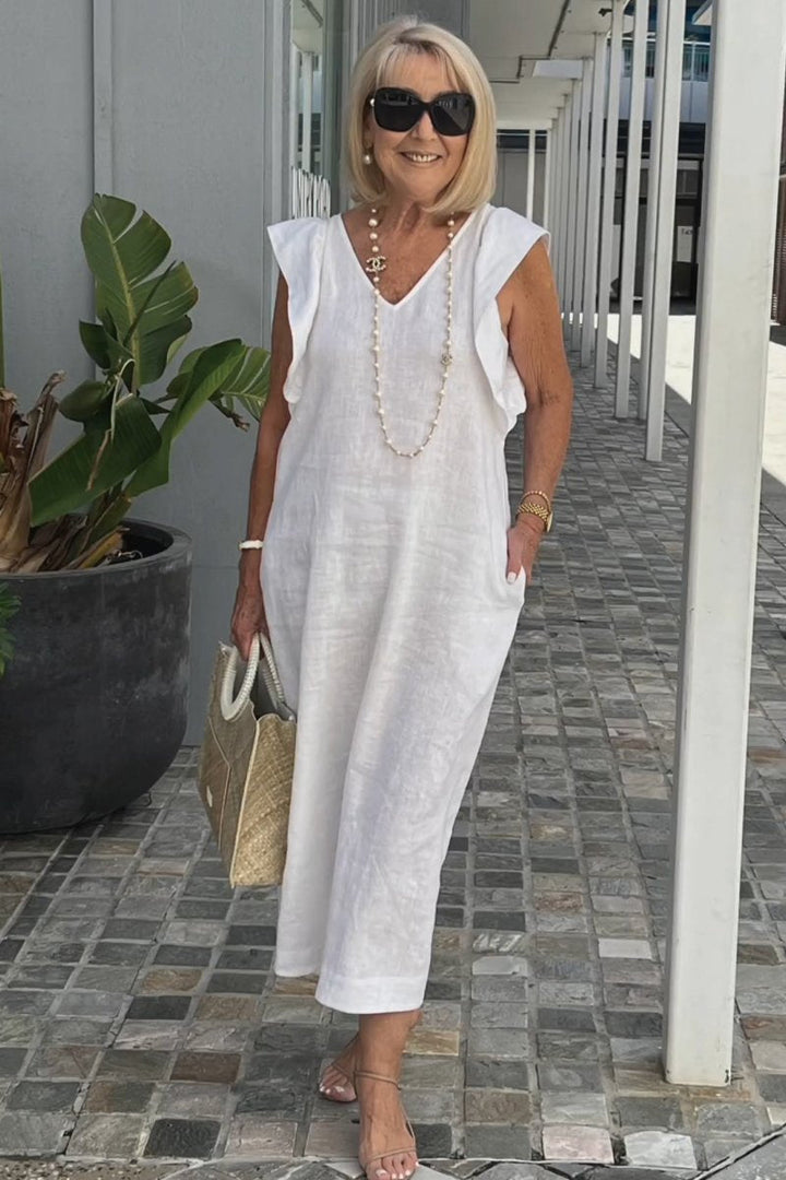 Casual yet elegant women's V-neck maxi dress, ideal for summer vacation & everyday style.