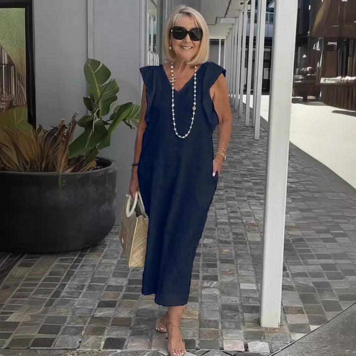 Flowy summer maxi dress for women, casual yet elegant, ideal for beachwear & resort.