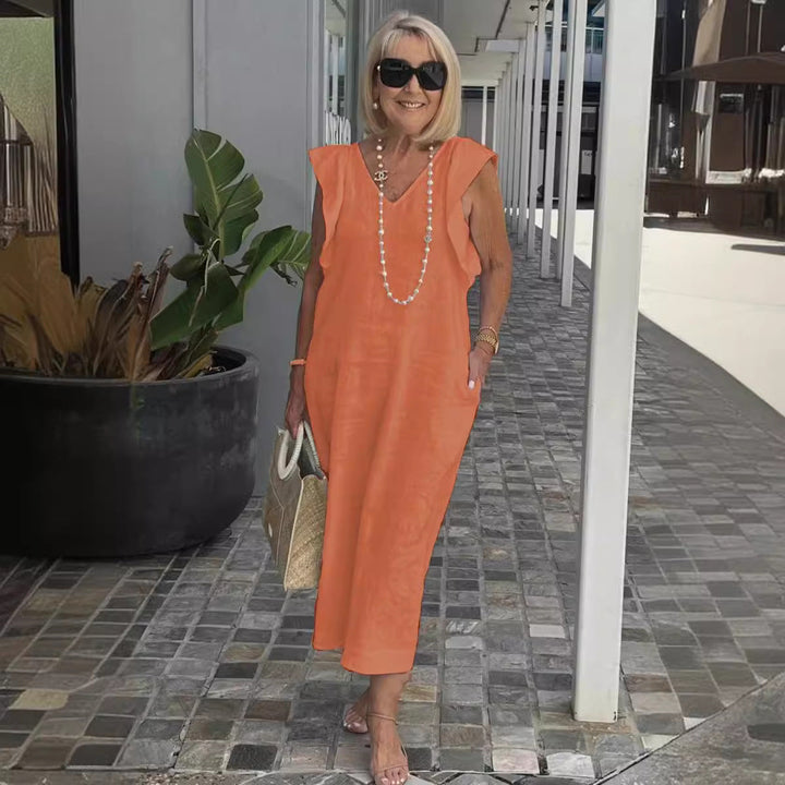 Stylish women's V-neck sleeveless maxi dress, great for summer parties & casual events.
