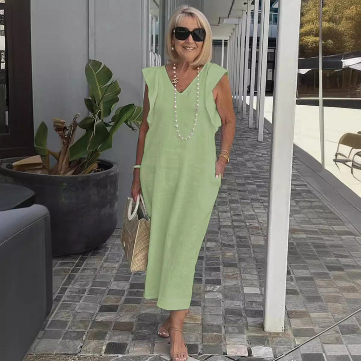 Beautiful elegant sleeveless maxi dress, a must-have for chic summer vacation fashion.