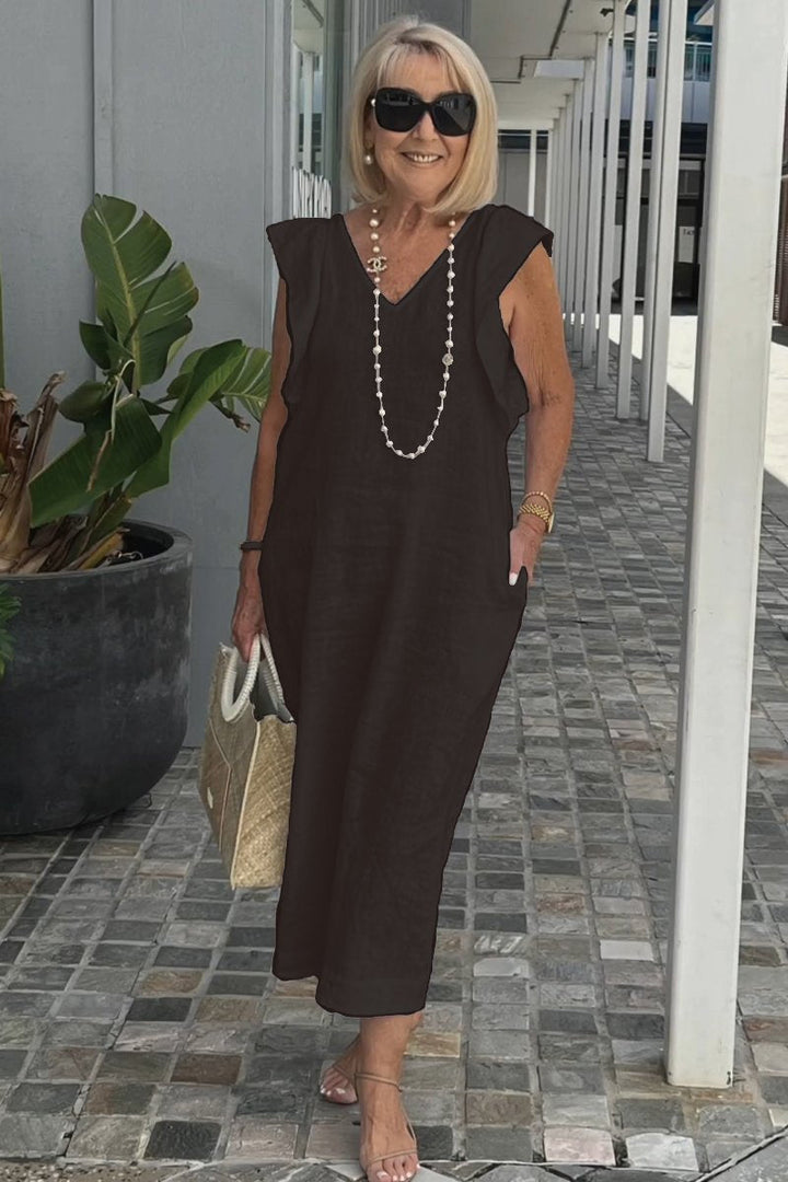 Fashionable women's summer maxi dress with flowy design, perfect for beachwear.