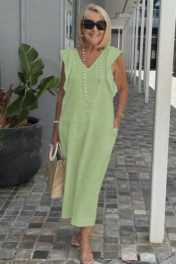 Flowy sleeveless summer dress, an elegant maxi design for women's fashion and comfort.