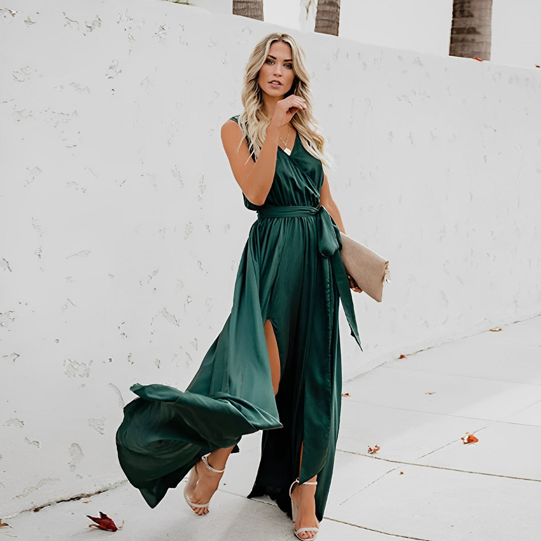 Beautiful women's elegant maxi dress, sleeveless with a chic waist belt, designed for weddings & special events.