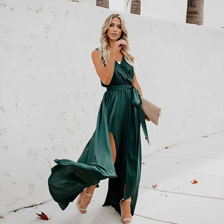Beautiful women's elegant maxi dress, sleeveless with a chic waist belt, designed for weddings & special events.