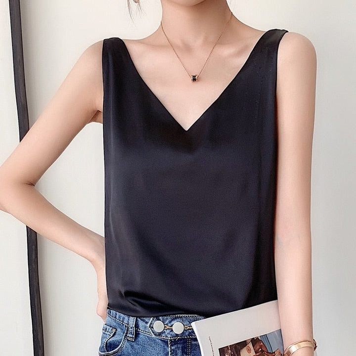 Comfortable & versatile women's flowy V-neck sleeveless top, ideal for casual or dressy outfits.