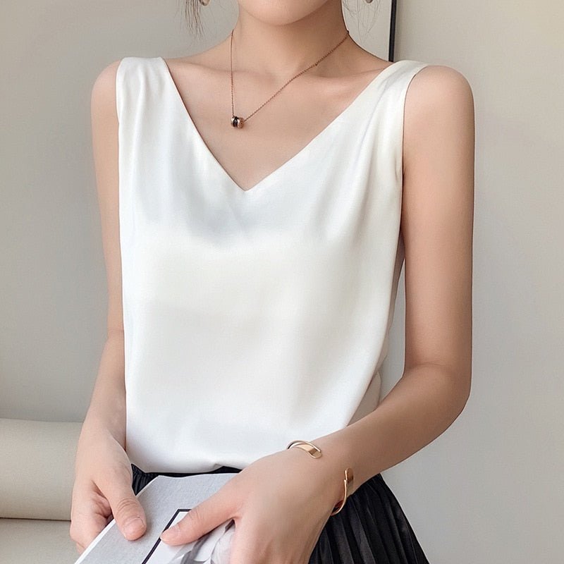 Stylish women's sleeveless V-neck blouse with a comfortable, elegant, and flowy design for any occasion.