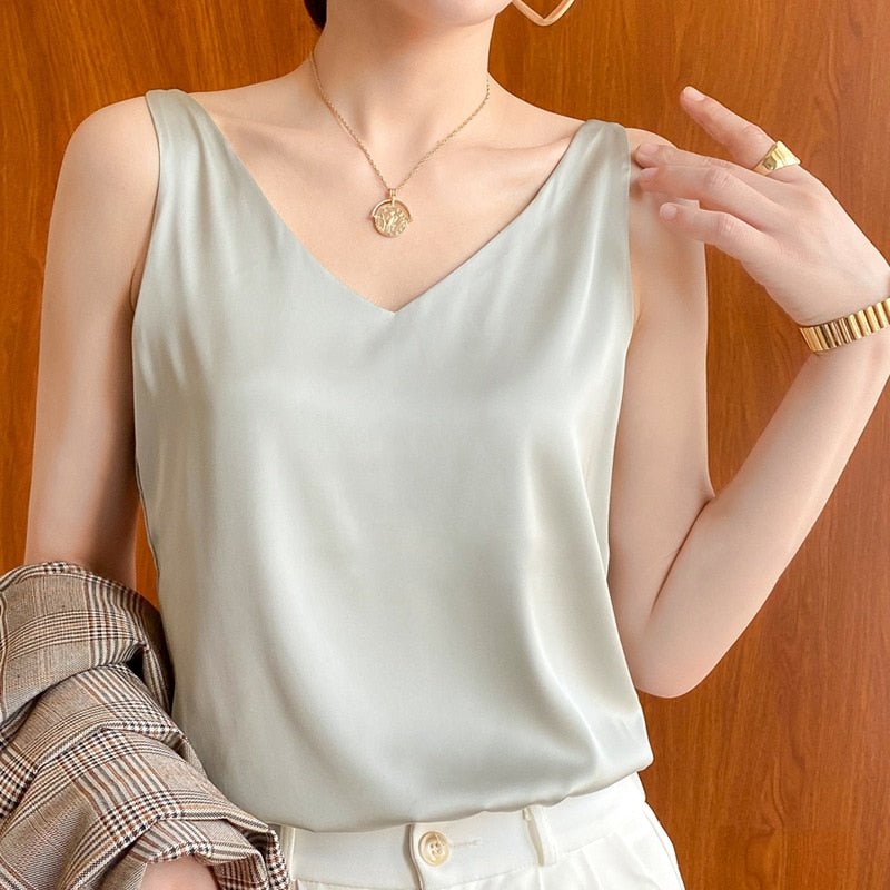 Women's Sleeveless V-Neck Top, an elegant and flowy blouse offering versatile comfort for spring & summer.