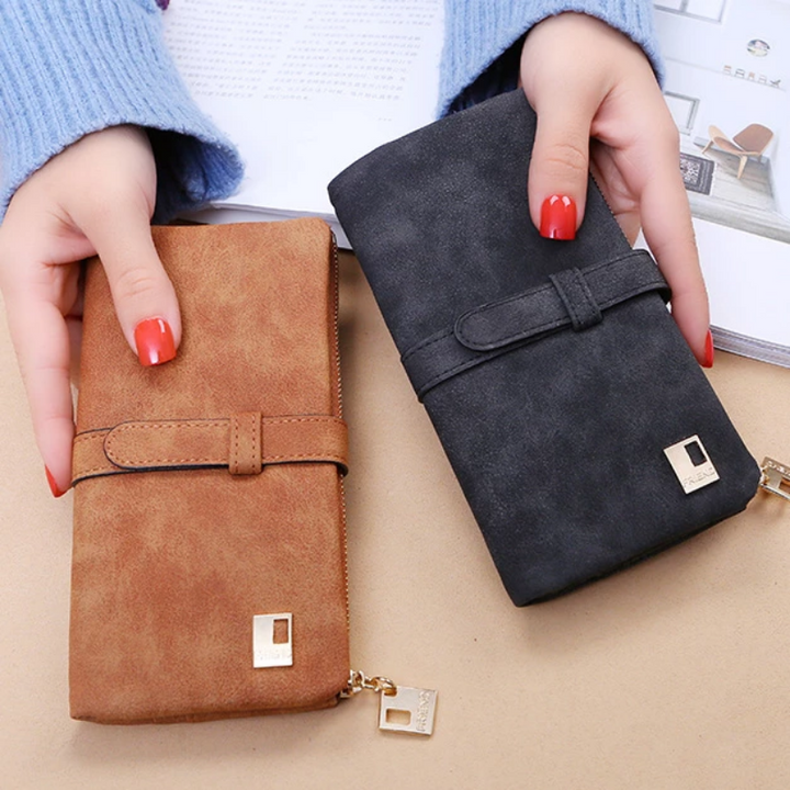 Spacious bi-fold long wallet for women, features multiple card holder slots and a section for phone storage.