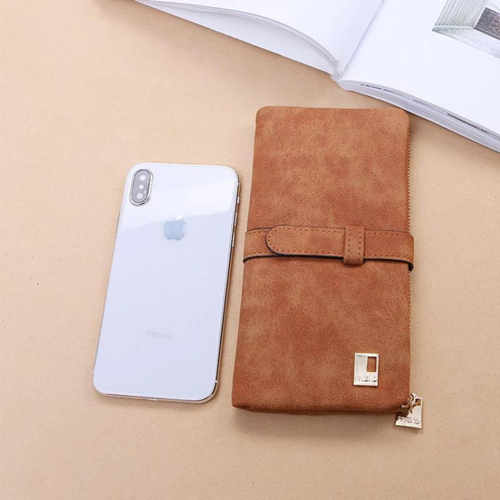 Practical women's bi-fold purse, a perfect gift for her. Slim design with ample space for cards & phone.