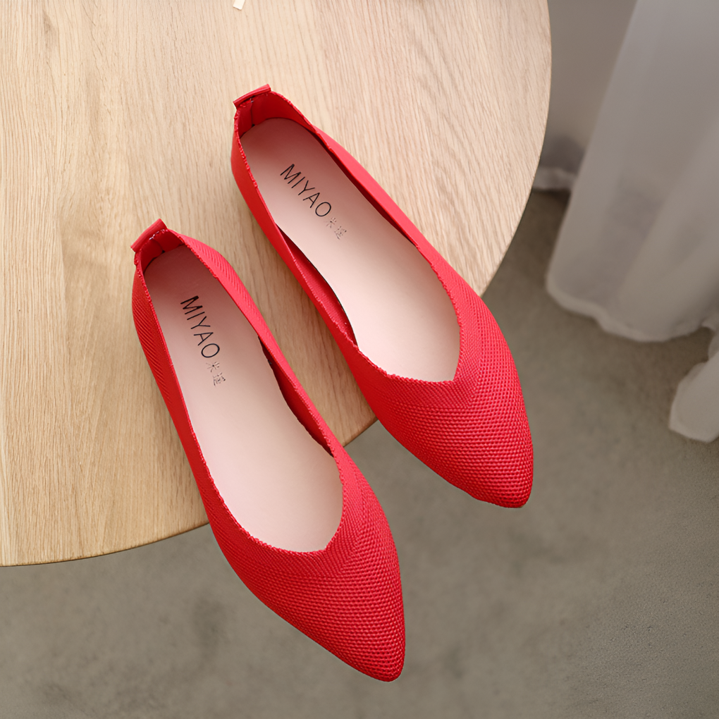 Stylish women's slip-on ballerina flats. Comfortable round-toe design for elegant casual spring and summer footwear.