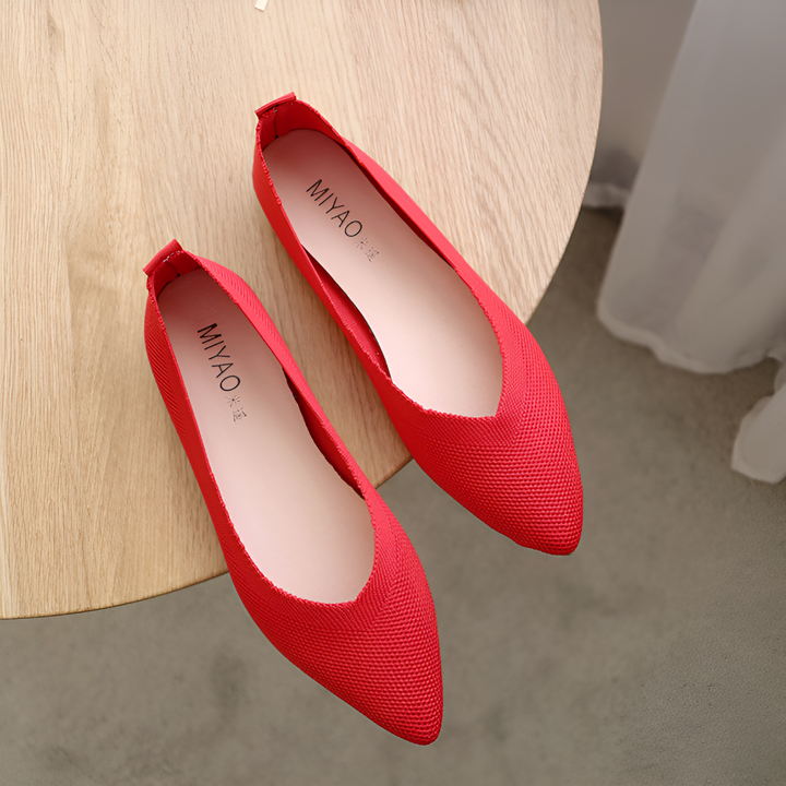 Stylish women's slip-on ballerina flats. Comfortable round-toe design for elegant casual spring and summer footwear.