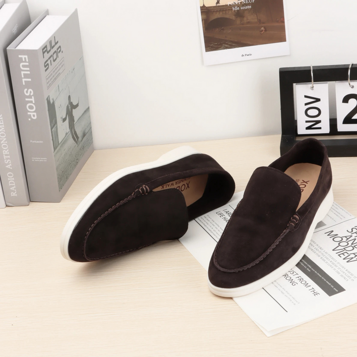 Stylish women's slip-on loafers with a sleek design, ideal for casual or semi-formal elegant comfort footwear.