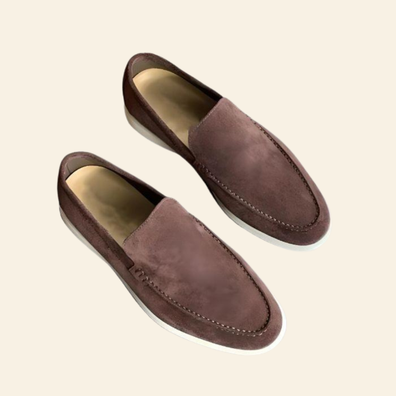 Close-up of elegant women's slip-on loafers, highlighting subtle texture & comfortable design. Stylish everyday flats.