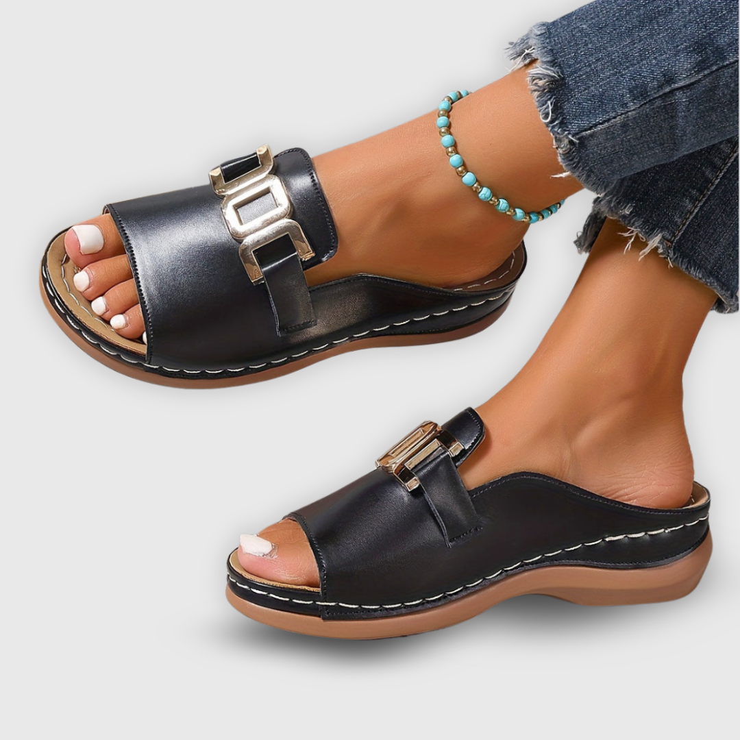 Modern women's slip-on shoes with comfortable flat design and versatile elegance.