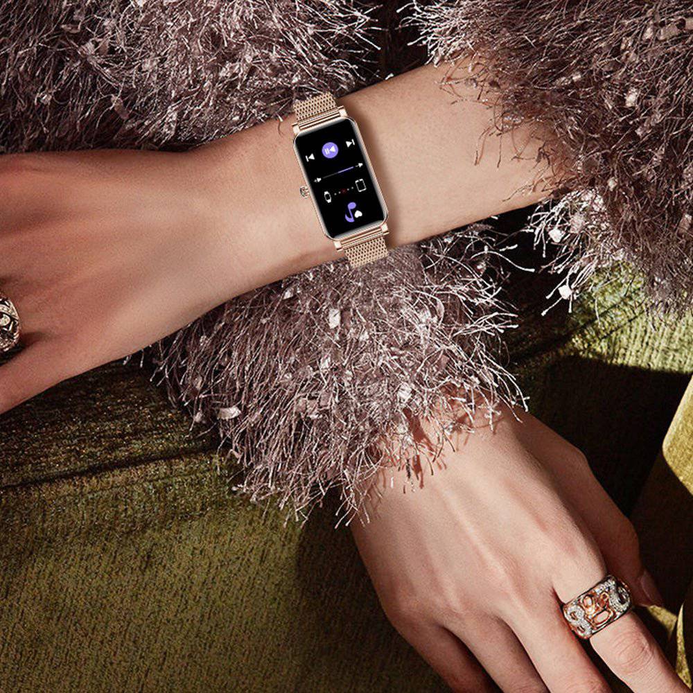 Women's fitness tracker smartwatch, monitoring steps, heart rate & workouts. Water resistant & rechargeable.