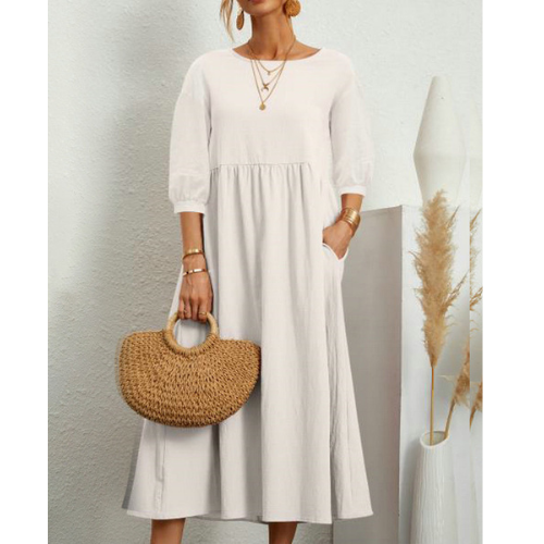 Comfortable & elegant women's smocked midi dress. Flattering summer style for warm weather days.