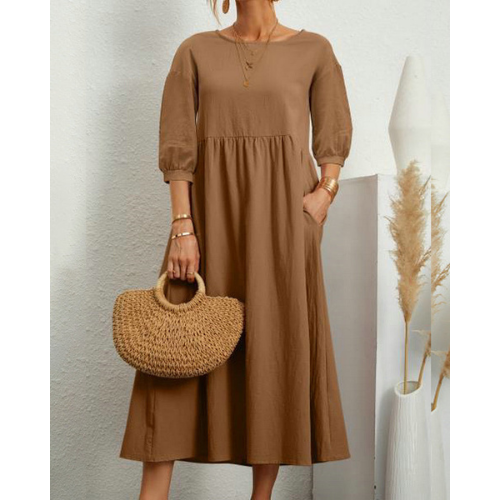 Elegant smocked midi dress for women. Comfortable & flattering sleeveless design, perfect for summer.