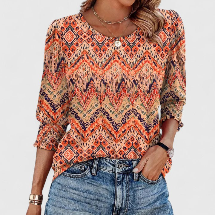 Women's elegant smocked top for summer fashion, a chic blouse with relaxed fit & everyday comfort.