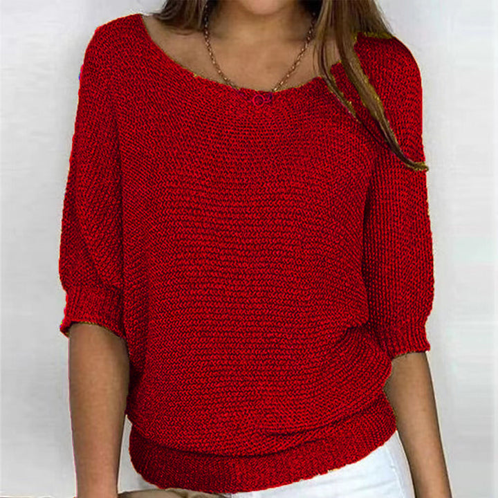 Women's soft knit crewneck long sleeve sweater, elegant and cozy for comfortable autumn and winter fashion.