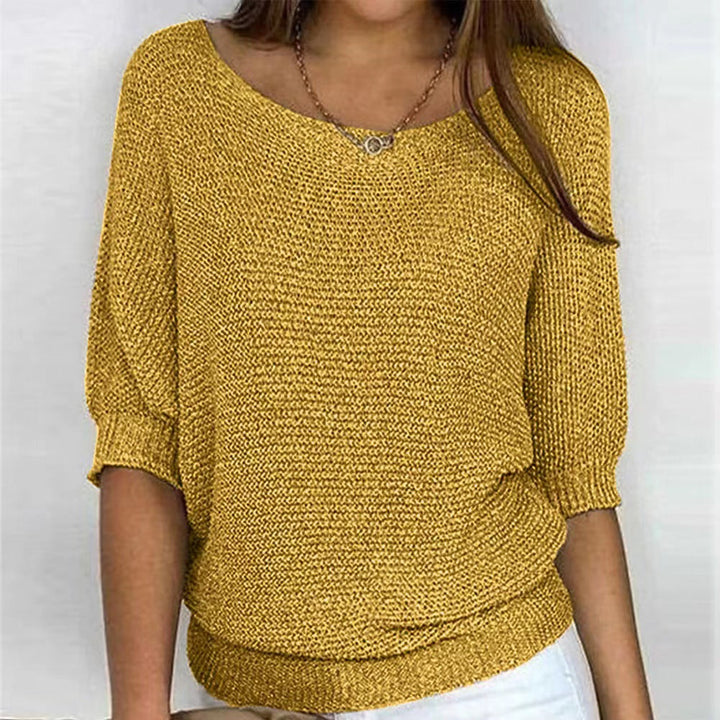 Soft knit women's sweater for autumn fashion, a comfortable & elegant top for any occasion.