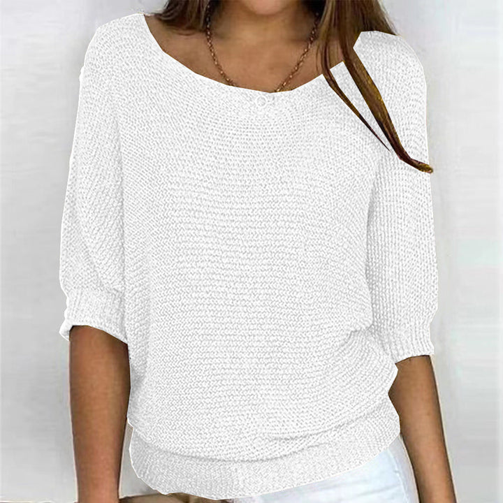 Comfortable soft knit women's sweater, an elegant crewneck top ideal for cozy everyday wear.