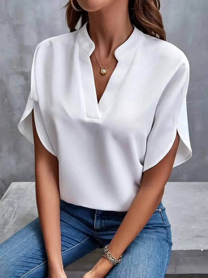 Elegant women's soft V-neck blouse, perfect for effortless everyday style. Versatile long sleeve top.
