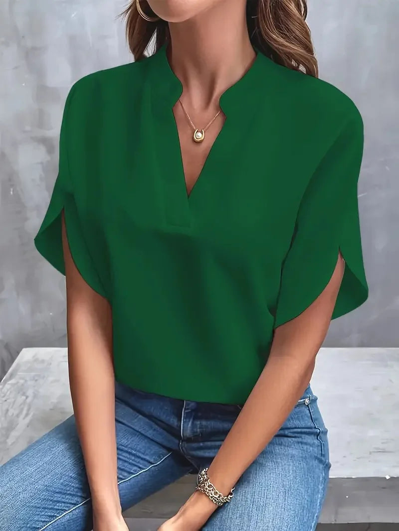 Soft women's V-neck blouse with a relaxed fit, an elegant long sleeve top for comfortable everyday fashion.