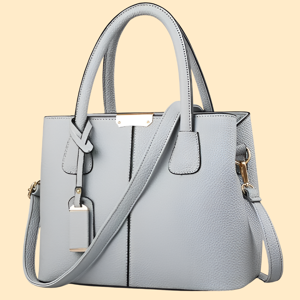 Versatile women's solid leather handbag, an elegant shoulder bag suitable for work, everyday, and fashion.