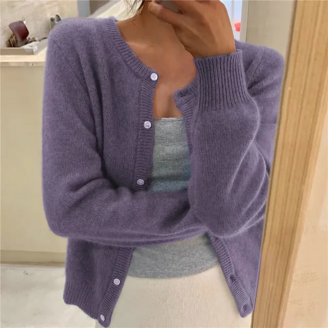 Soft women's long sleeve solid cardigan sweater, perfect for cozy and versatile everyday wear.