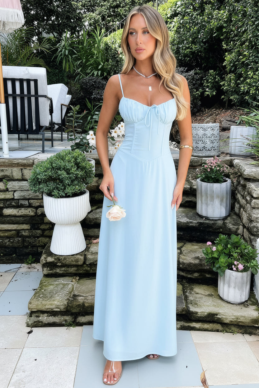 Formal women's spaghetti strap maxi dress. Flattering A-line design, ideal for evening parties or wedding guests.