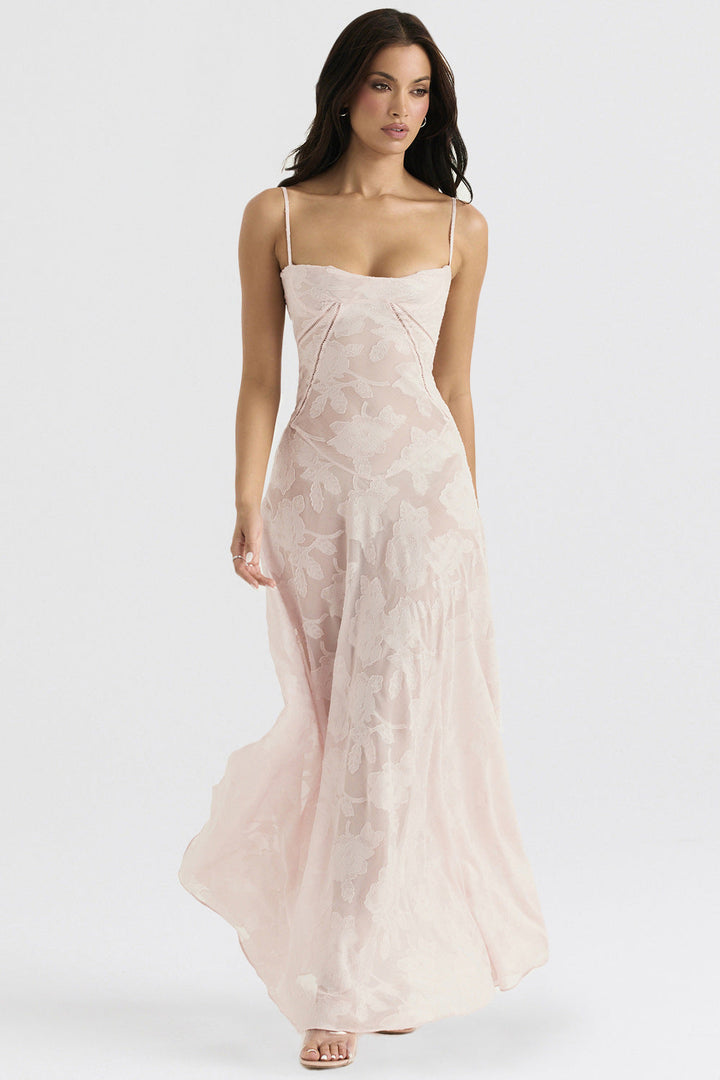 Flowing spaghetti strap maxi dress for women. Elegant design, slim fit, perfect as a summer or evening dress.