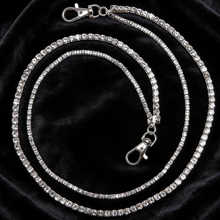 Close-up of a glamorous women's crystal rhinestone chain, an elegant and sparkling jewelry accessory.