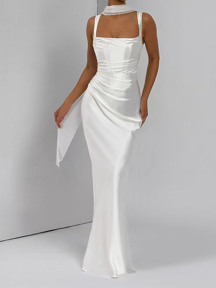 Sophisticated women's square neck maxi evening dress. Elegant long gown with ruched bodice, ideal for formal parties.