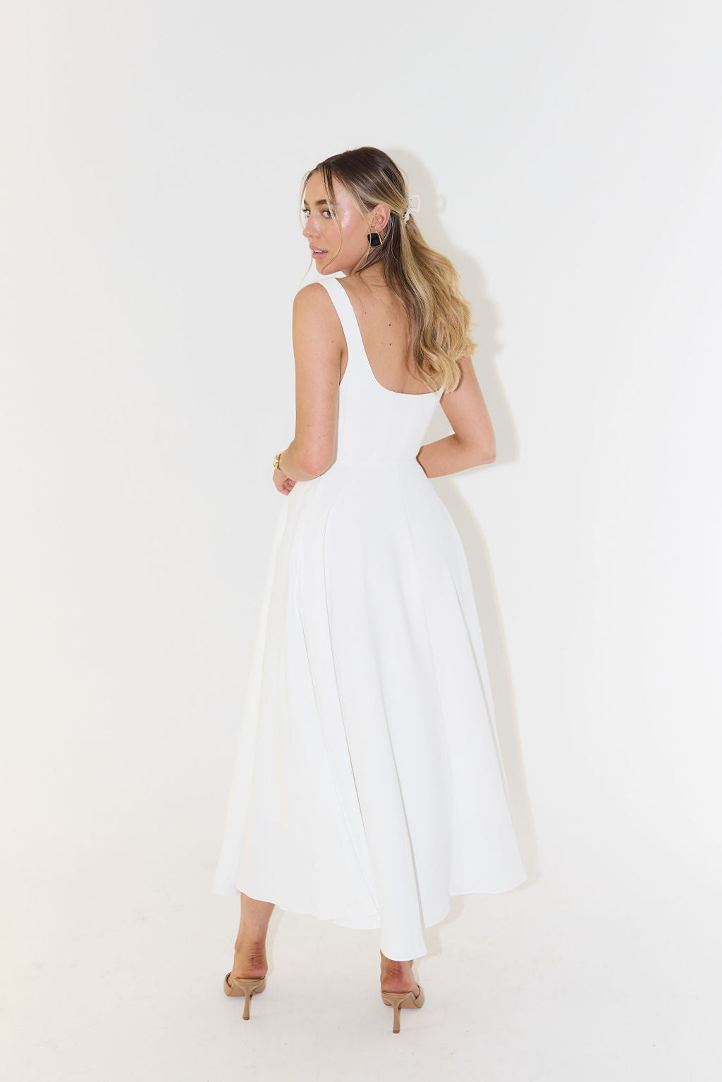 Sophisticated women's square neck midi dress with a flattering A-line silhouette, ideal for chic events.