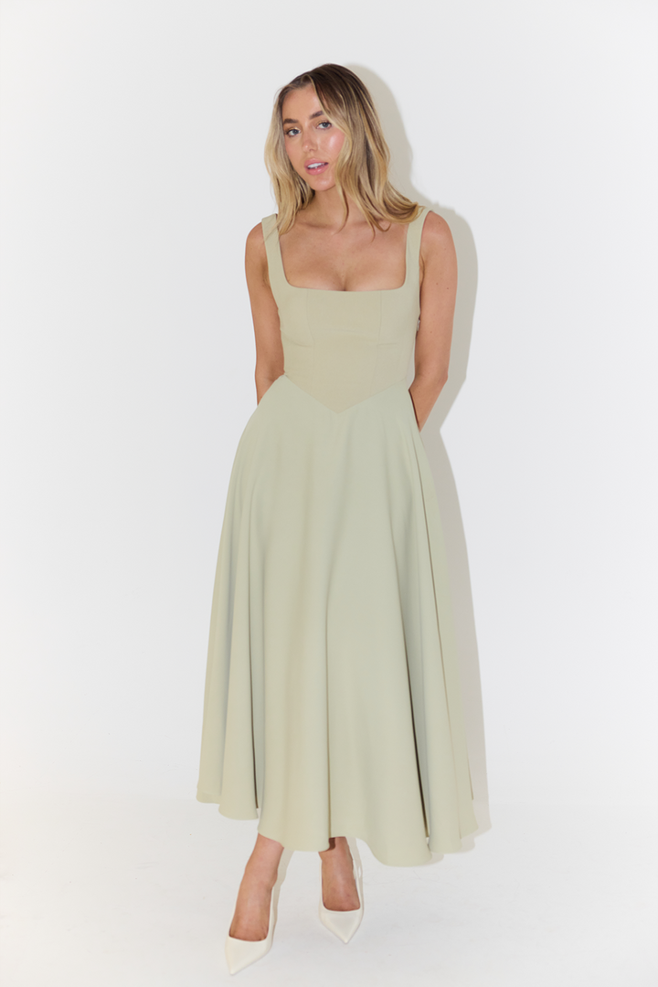 Luxurious elegant square neck midi dress for women, perfect for a chic party or formal event look.