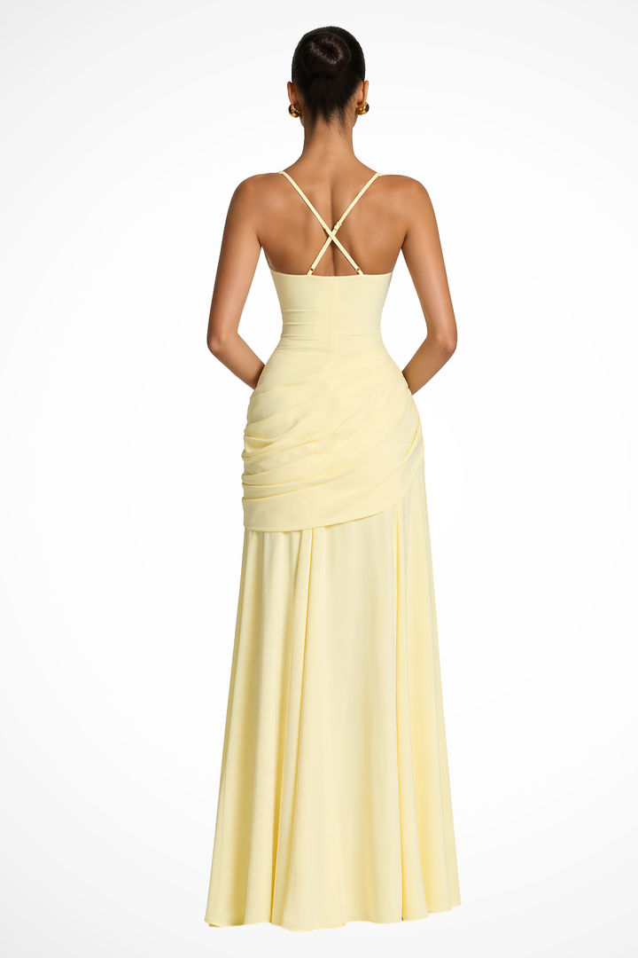 Women's formal maxi dress featuring a stylish square neck, flattering ruched details, & an elegant side slit.