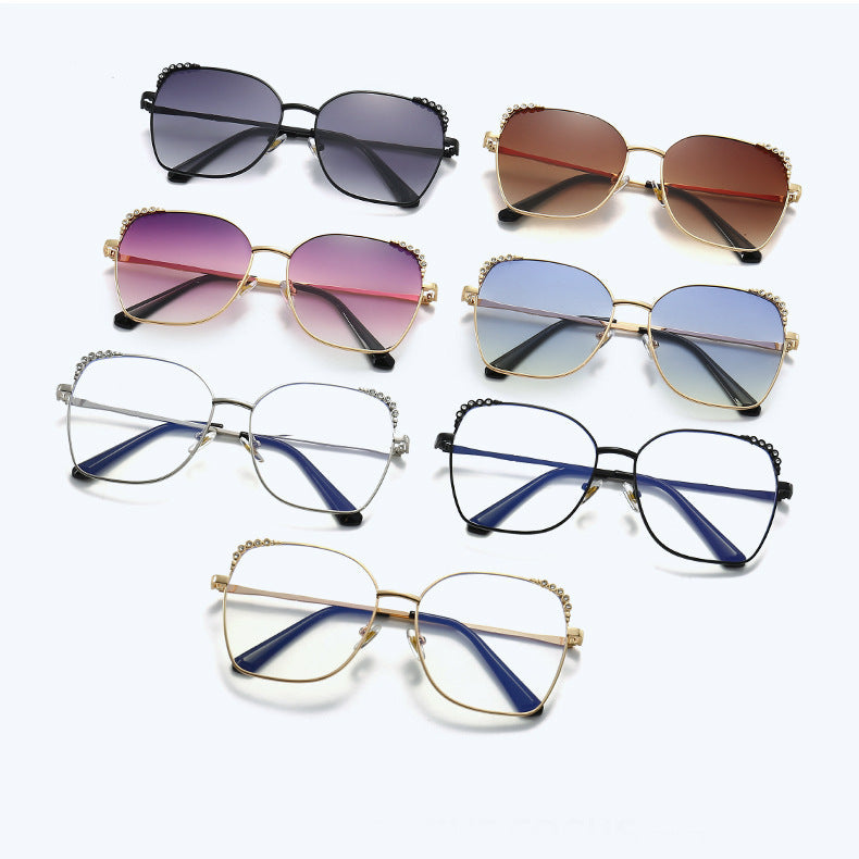 Stylish women's square sunglasses. Features sparkling accents & UV protection for luxury fashion.