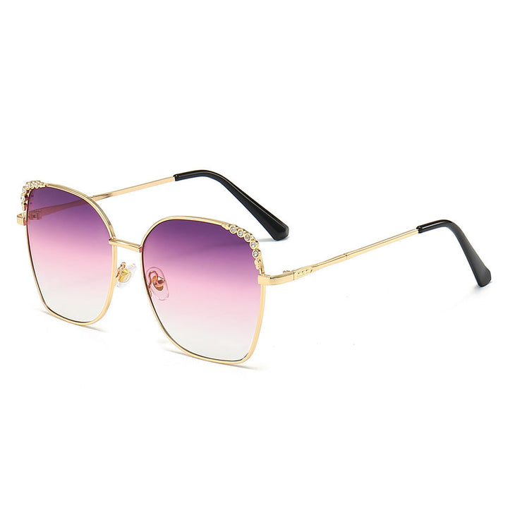 Women's square frame sunglasses with sparkling accents, offering elegant fashion eyewear.