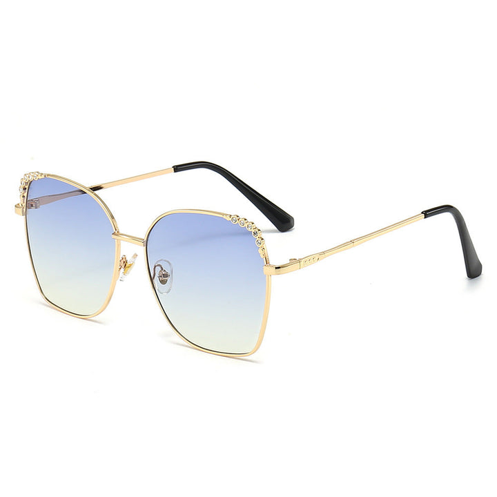 Fashionable women's square sunglasses with dazzling sparkling accents. Chic & elegant eyewear accessory.