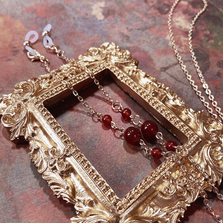 Sophisticated red accent stainless steel chain necklace for women. A durable & stylish jewelry gift.