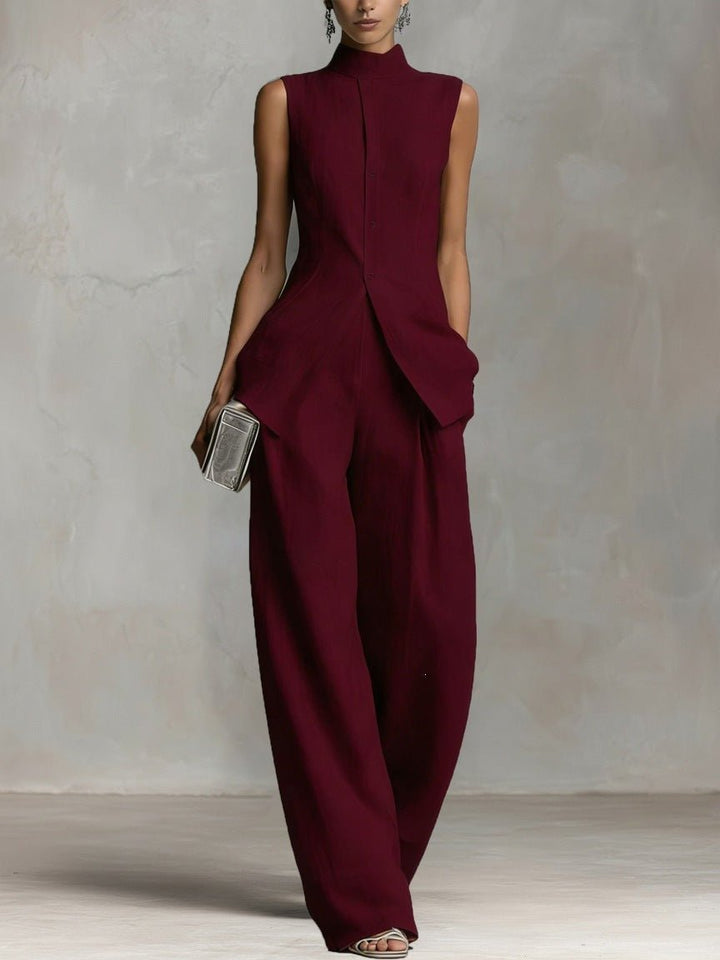 Modern women's stand-collar two-piece set with high-waisted wide-leg trousers. Versatile & chic.