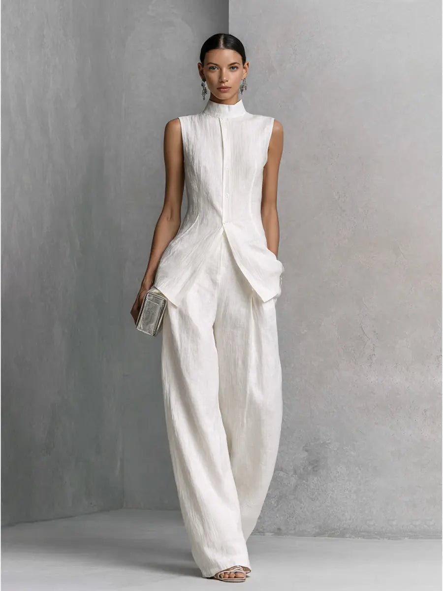 Women's sleeveless stand-collar top & high-waisted wide-leg trouser set. Sophisticated fashion.