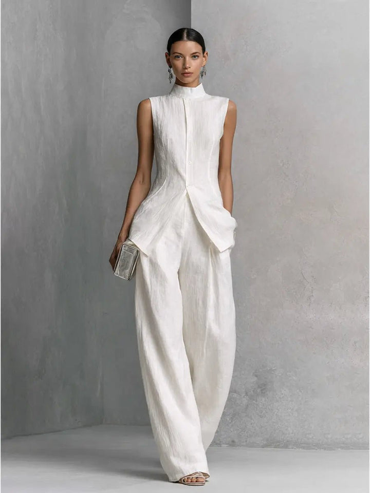 Women's sleeveless stand-collar top & high-waisted wide-leg trouser set. Sophisticated fashion.
