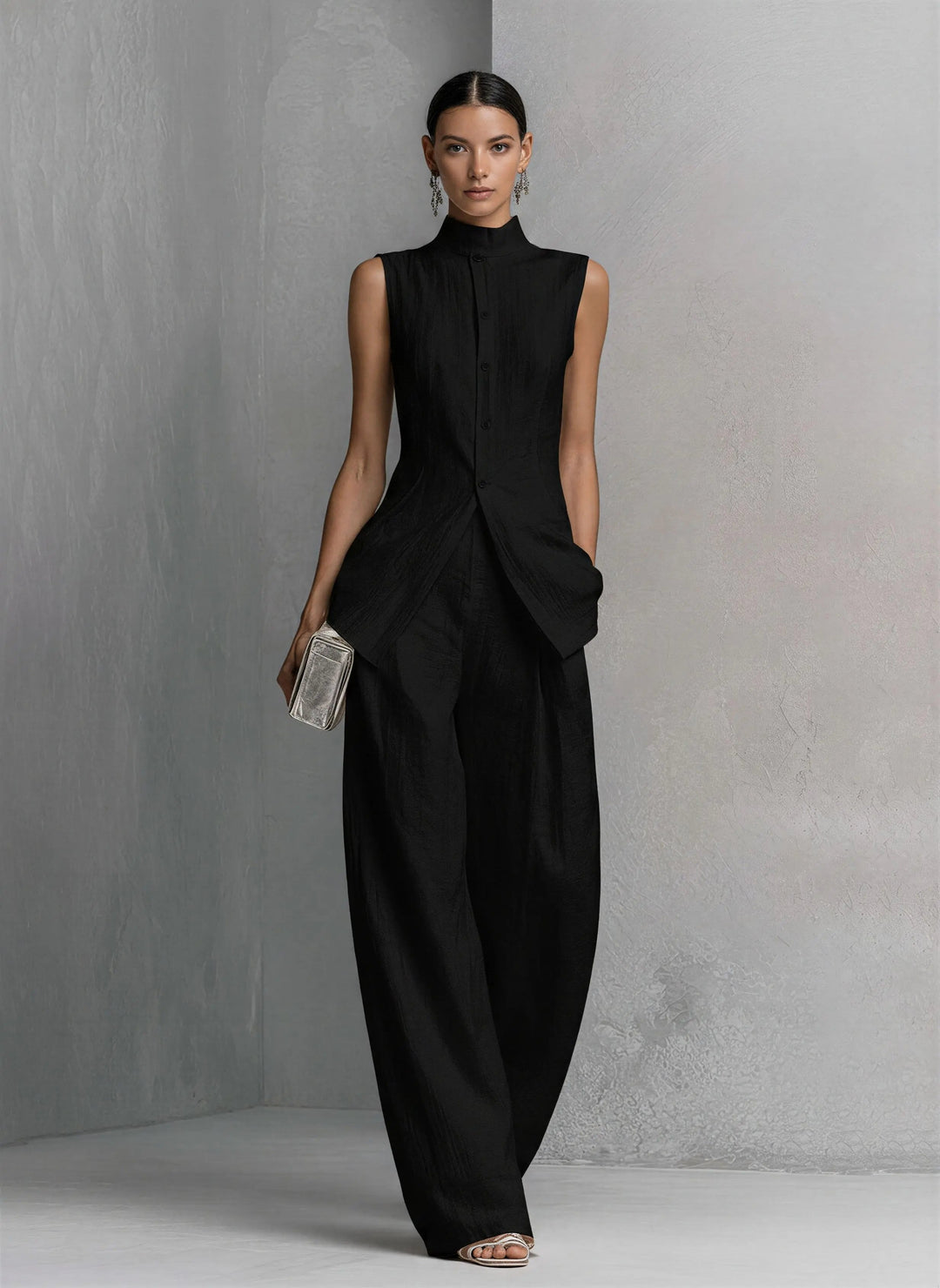 Casual chic women's two-piece set with a stand-collar top and flowy wide-leg trousers.